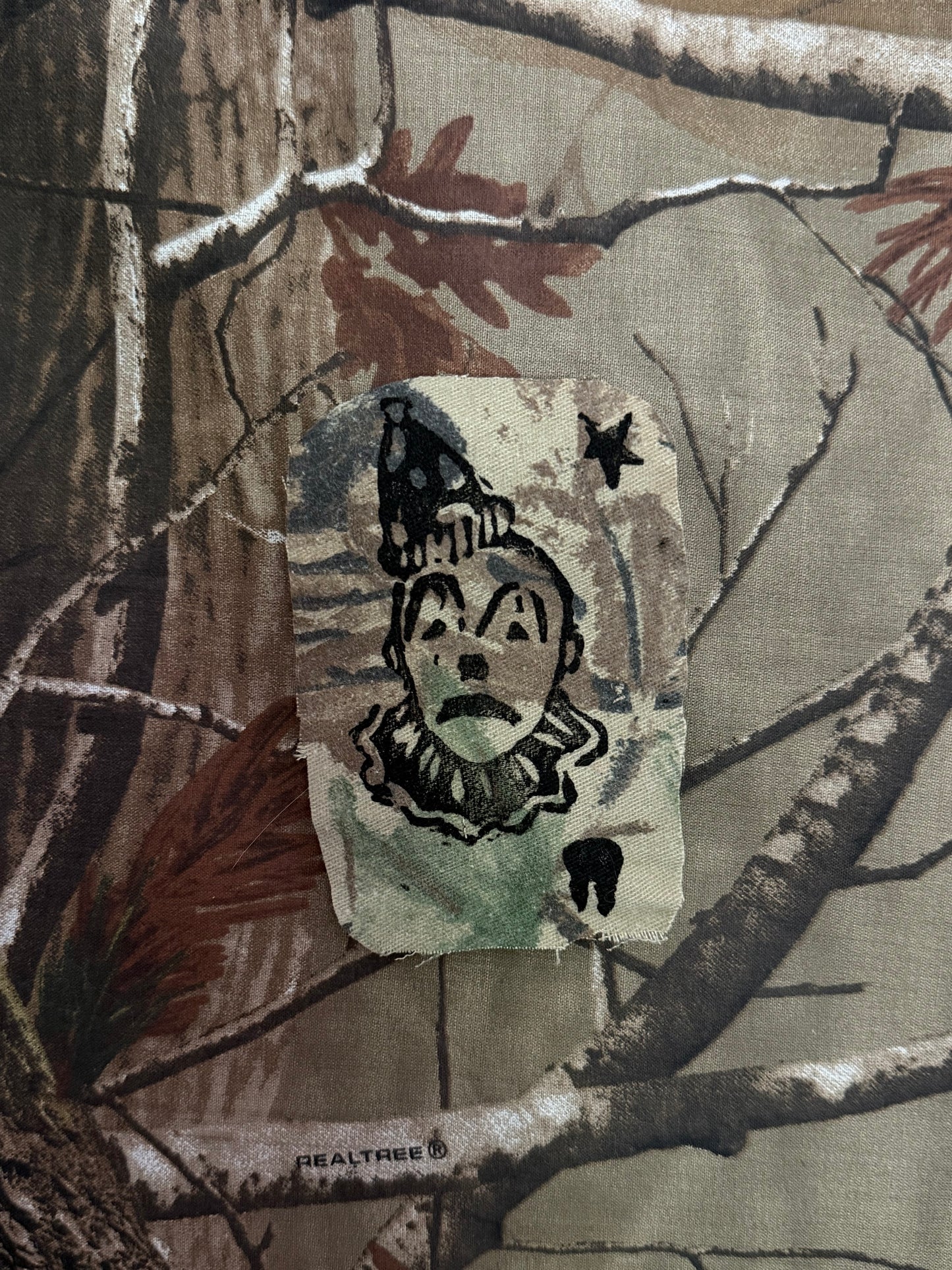 canvas woodlands sad clown patch